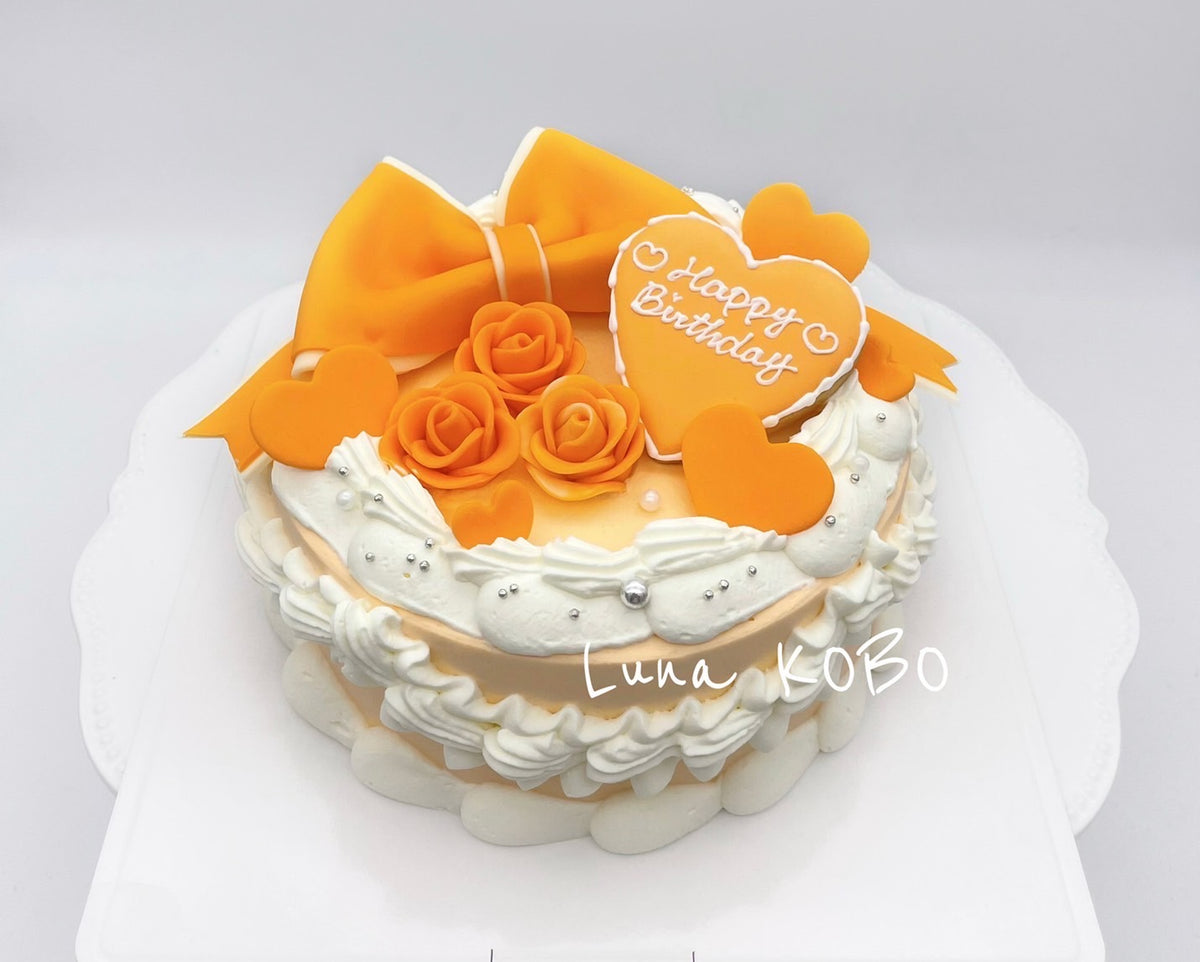 2重リボンケーキ（オレンジ） – 【オーダーケーキの通販・専⾨店